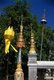 Thailand: A traditional Lanna lantern, used during the annual Loy Krathong festival, next to small Burmese-style chedi at Wat Saen Fang, Chiang Mai